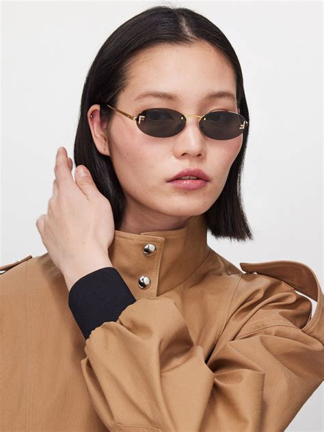 fendi eyewear rimless round metal sunglasses